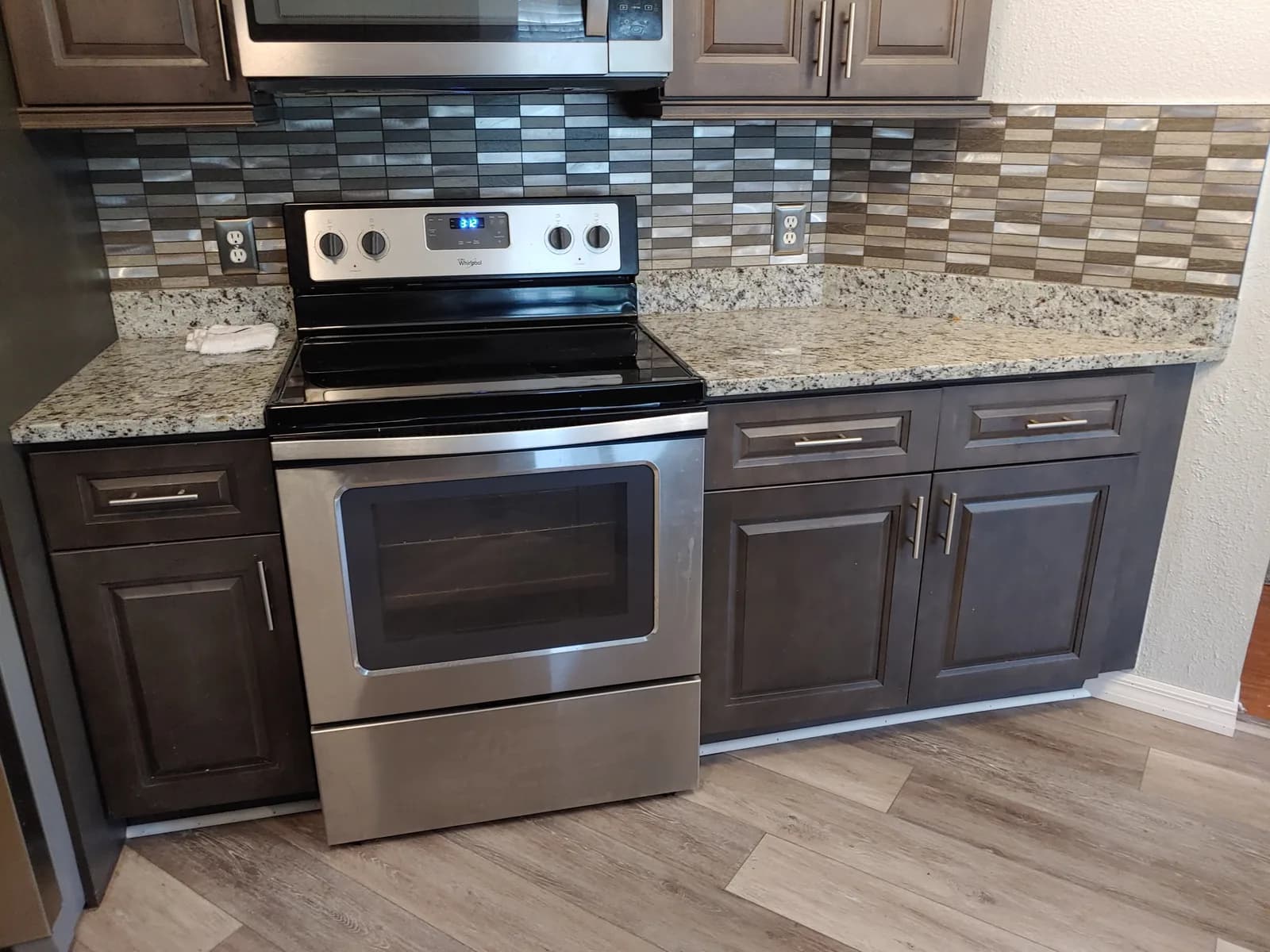 Zellige style kitchen backsplash in warm cream tones