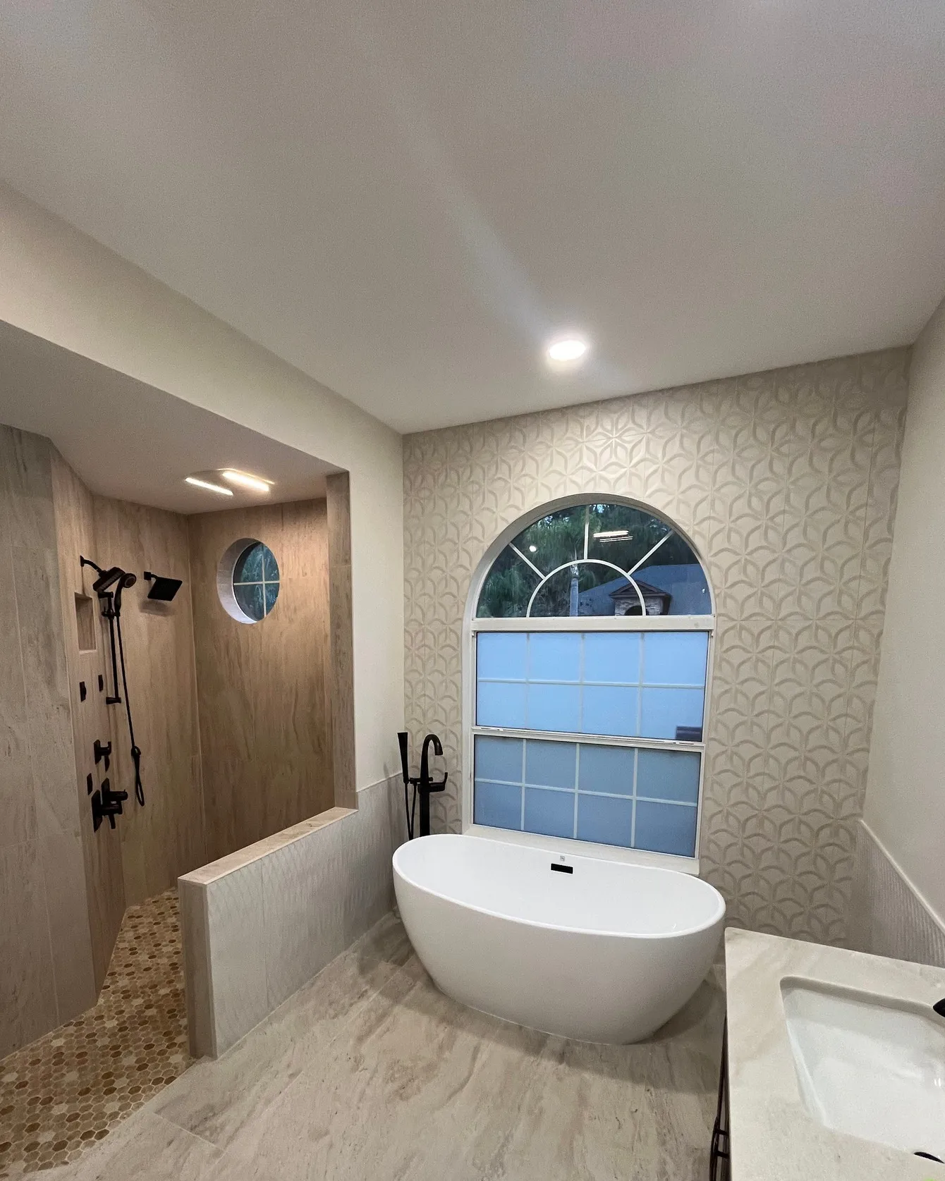 Custom tile installation in a Tampa Bay bathroom by Coastal Tile